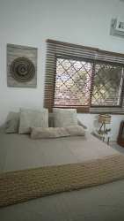 Bright master bedroom with AC, ensuite bathroom and tile floor in Nueva Gorgona house