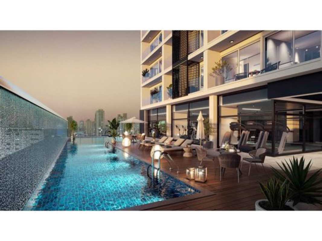 Rooftop terrace lounge area with greenery at PH The Hub Panama