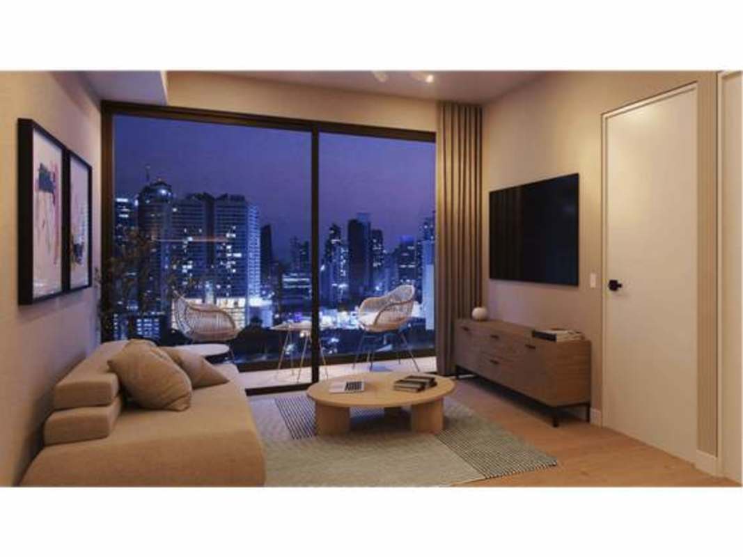 Living room with city night skyline view PH The Hub Panama