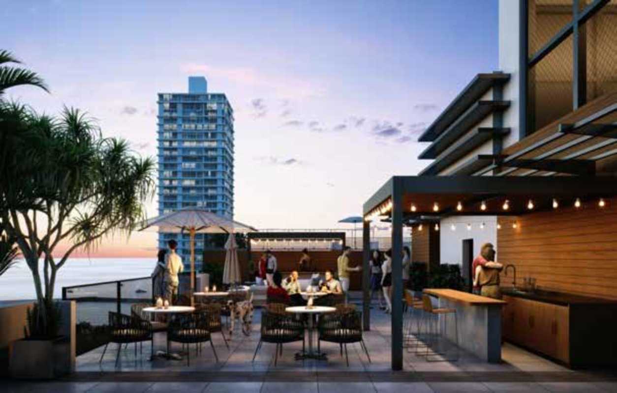 Terrace lounge with outdoor kitchen, pergola, dining area, ocean city view at PH Armonía