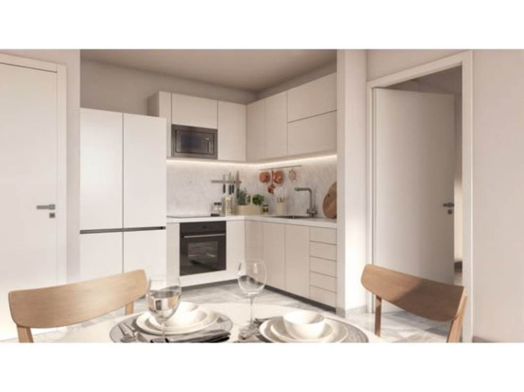 Living and dining space with sliding glass balcony doors in PH Bella Vista Tower 2 Panama