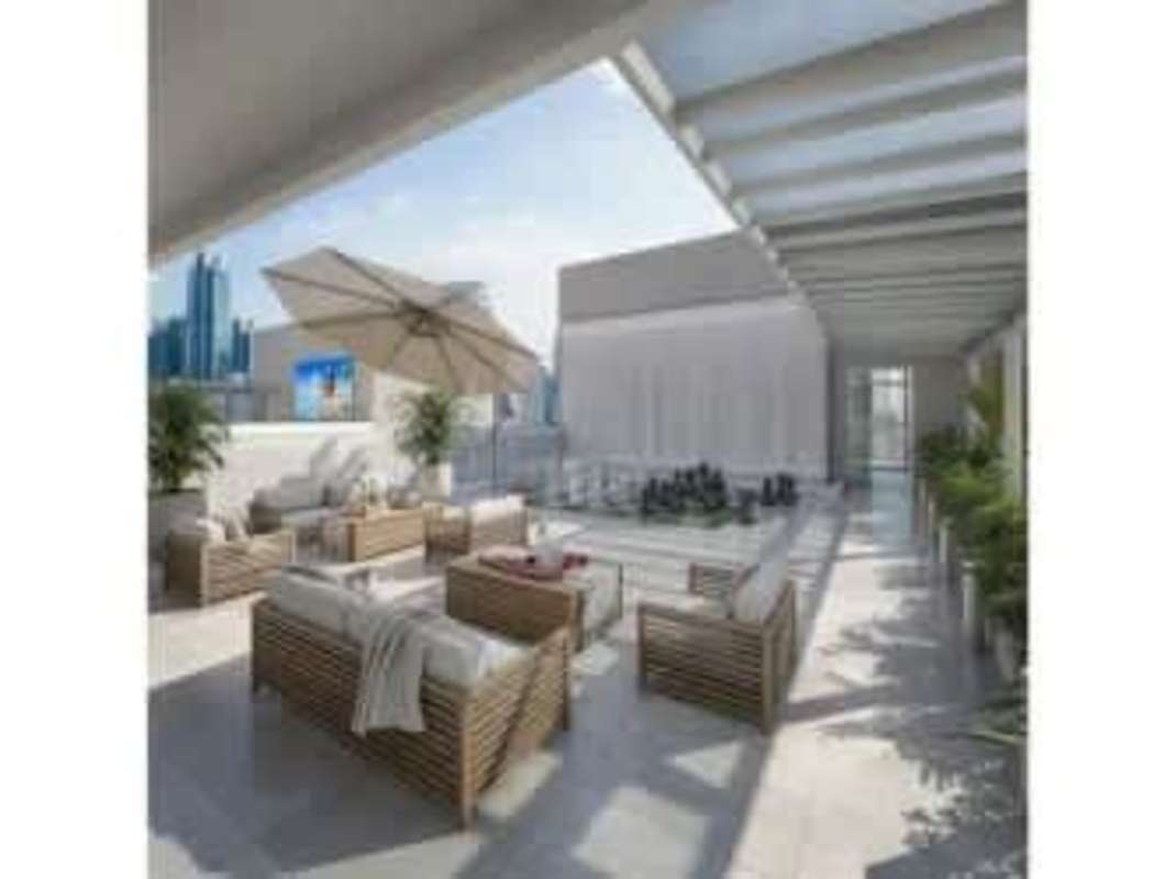 Contemporary open-plan living room with kitchen and balcony access in Bella Vista Tower Panama