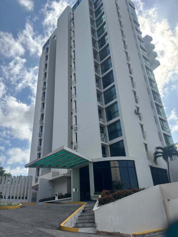 Modern high-rise condo building PH Oceania 200 with balconies and landscaped entry in Edison Park Panama City