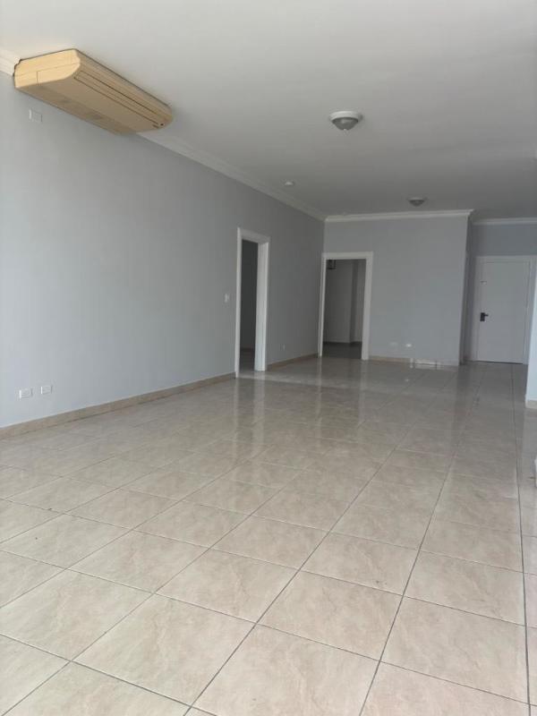Large empty ceramic tiled living room with open plan design in PH Oceania 200 Edison Park Panama City