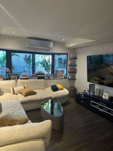Dining room with wood ceiling, skylight, large glass doors to garden San Francisco Panama