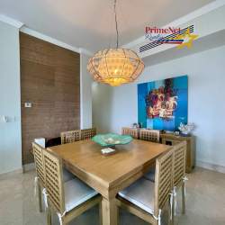 Contemporary dining room with wood furniture and beach decor Bijao Panama