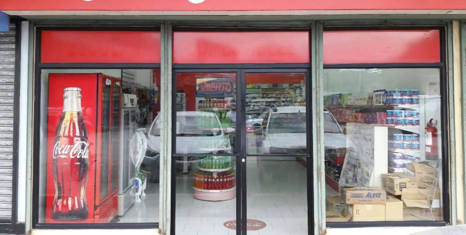 Mediterranean style shopping plaza with clock tower arches parking Plaza Mis Provincias Rufina Alfaro Panama