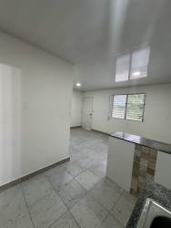 Open living dining space with window and tiled floor Penonomé apartment