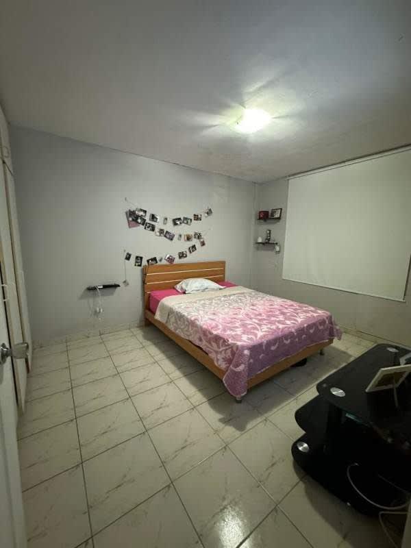 Bedroom with tile floors, closet and window PH Park View La Loma Panama