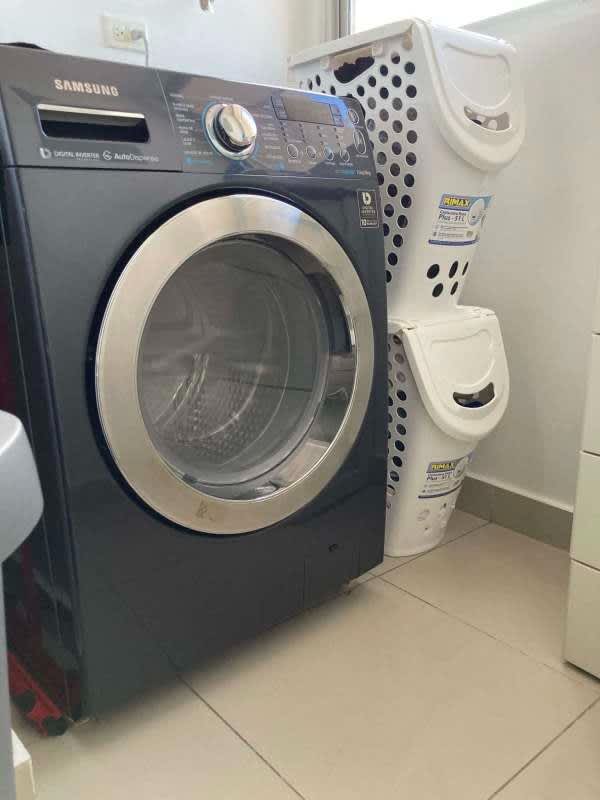 Modern bathroom with glass shower enclosure tile walls toilet PH Centennial Panama