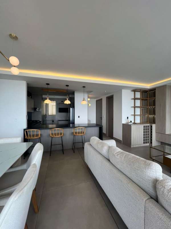 Modern kitchen with granite countertops, breakfast bar, and quality finishes at PH Victory Altos de Golf Panama