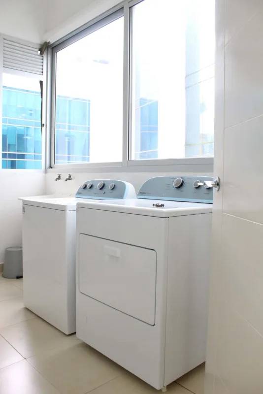 Bright laundry room with washer dryer PH Water On The Bay Panama City