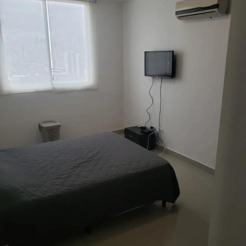 Clean modern secondary bathroom with glass shower and tile in PH Diamond Tower Panama City