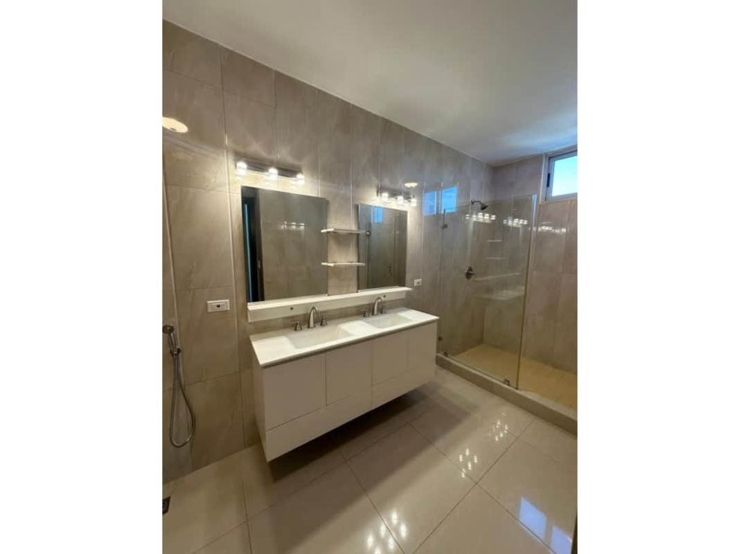 Contemporary dining space with large windows in PH Top Towers Costa del Este Panama