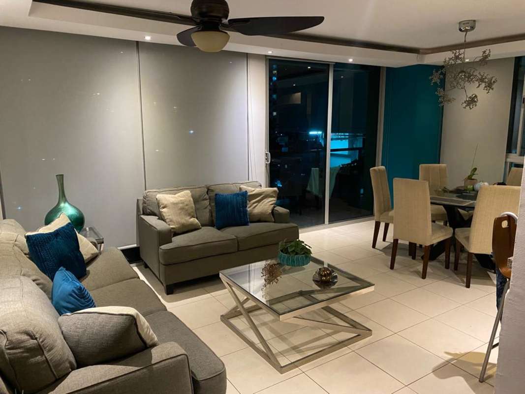 Bright open living and dining room with city views in PH Tao Towers San Francisco Panama