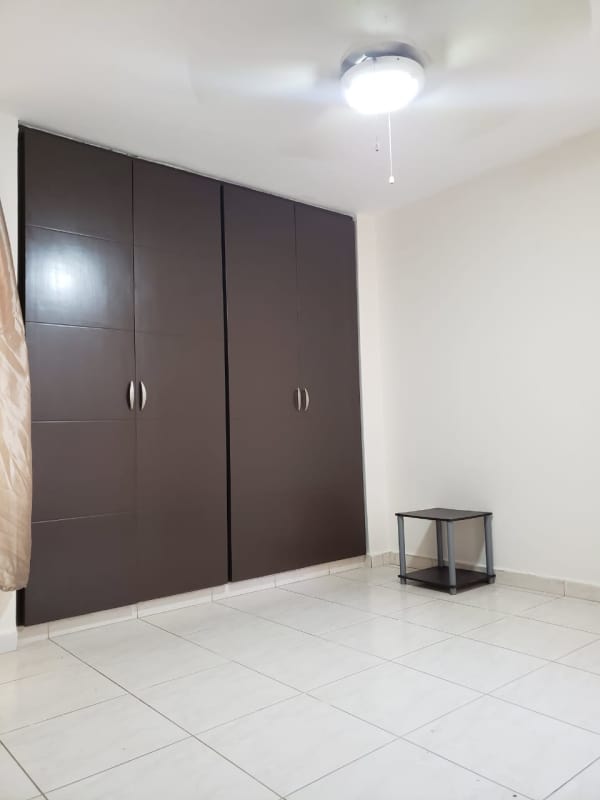 Guest bedroom with built-in closet and tiled floor PH Imperial Towers Panama
