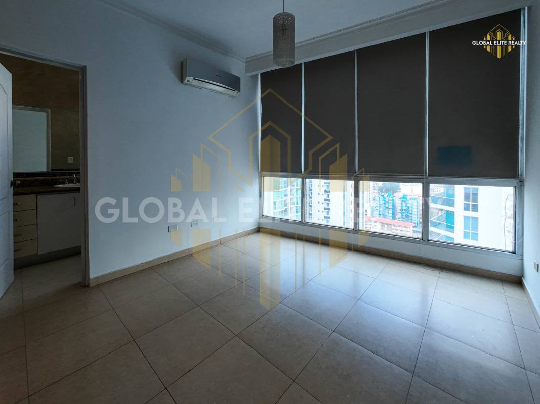 Bright master bedroom with large windows and ocean views PH Marina Park Bella Vista Panama