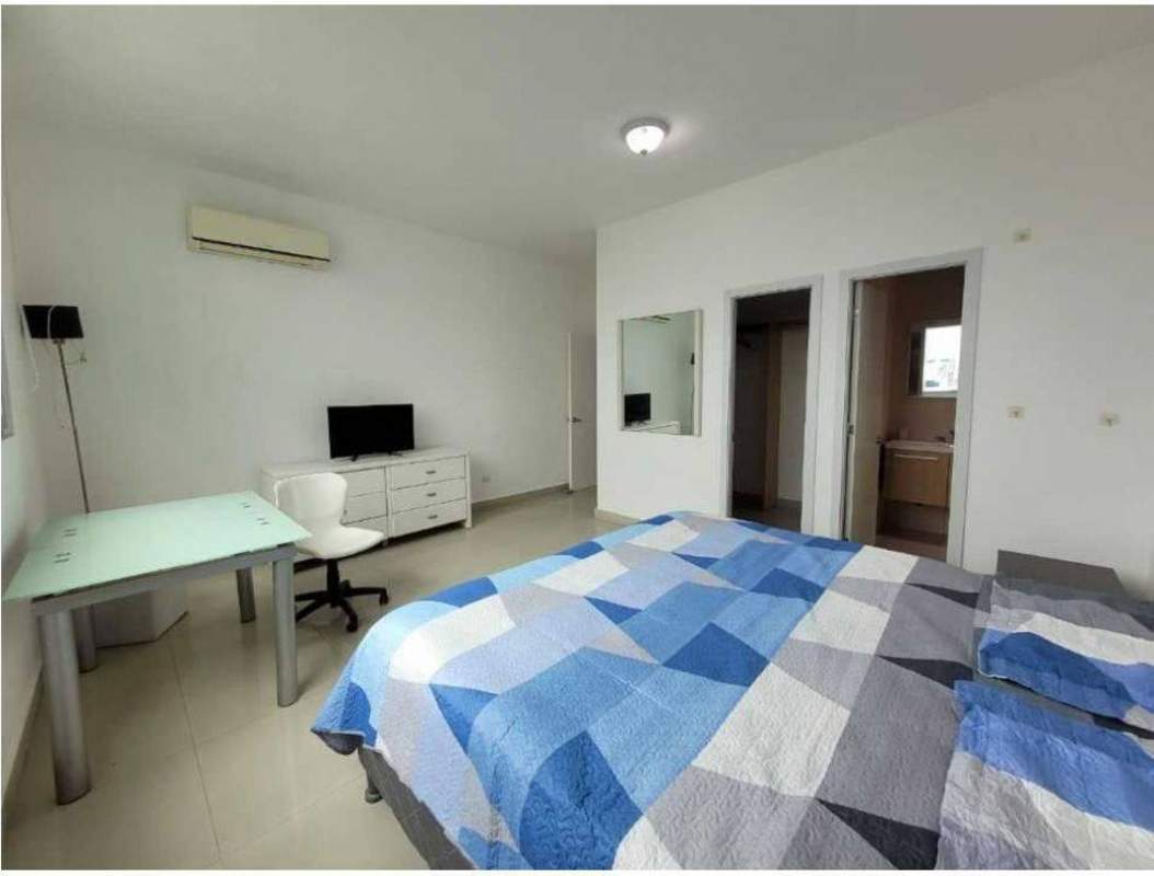 Modern kitchen featuring granite counters, stainless steel fridge and gas stove PH Astoria Panama City