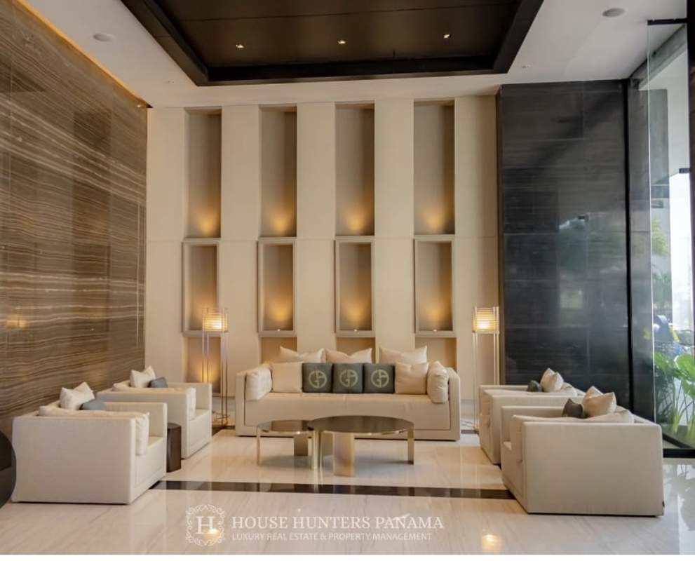 Bright living space with marble flooring, panoramic windows, balcony city and bay views at Nuovo Panama City