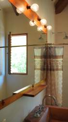 Private outdoor terrace surrounded by tropical vegetation in beachfront loft at Pedasí