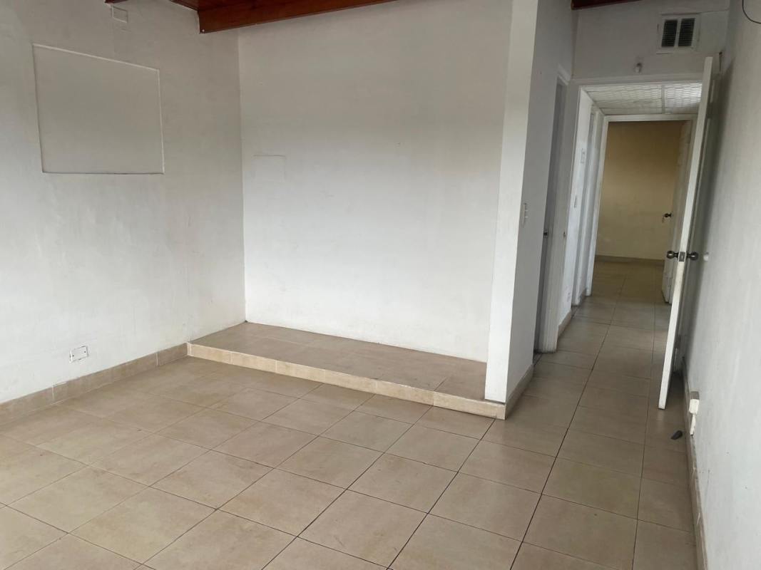 Interior common area space with tiled flooring inside PH Altos del Chase commercial unit El Dorado Panama