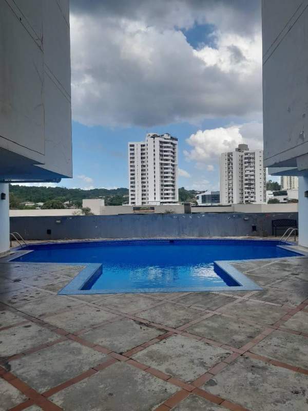 Building rooftop swimming pool with city skyline view PH El Dorado Betania Panama for rent