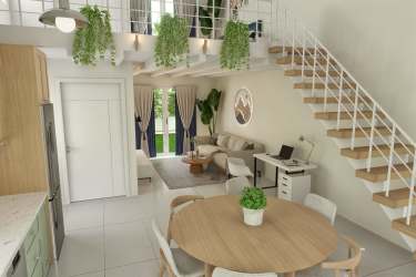 Open living dining area with loft bedroom, modern staircase and large windows at Cozy Venao loft apartments in Panama