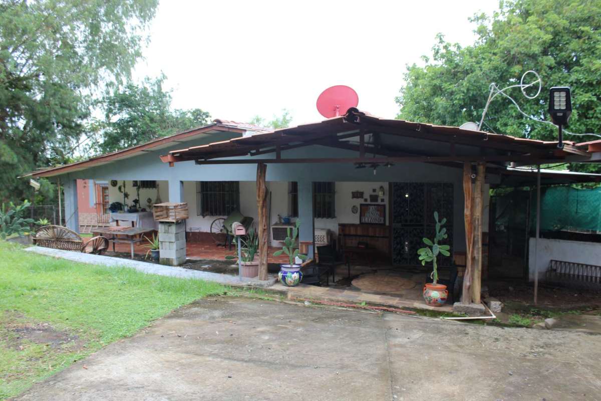 Aerial showing large garden, pool, house and greenery in Cerro Azul mountain community