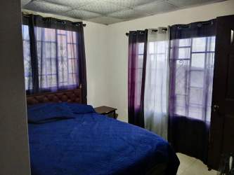 Large covered balcony with scenic mountain and sea views Panama