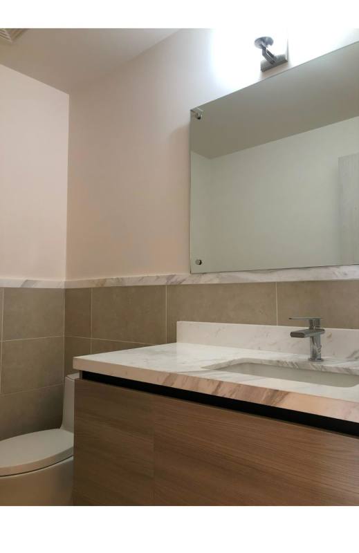 Bright playroom with trampoline, climbing wall, slides inside PH Ocean House Santa María Panama