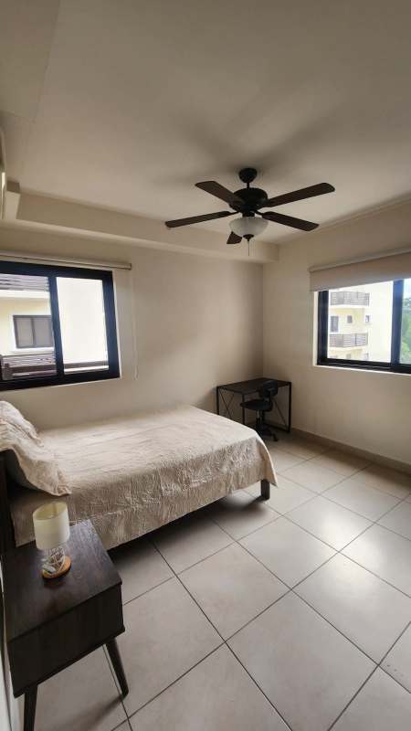 Modern master bathroom marble top vanity walk-in shower Embassy Club Residences Panama