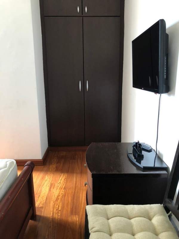 Bedroom featuring ocean view, inverter AC and built-in closet PH Met 1 Tower