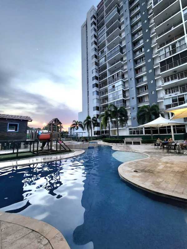 Multiple high-rise residential towers with balconies in PH Cosmopolitan Towers Panama