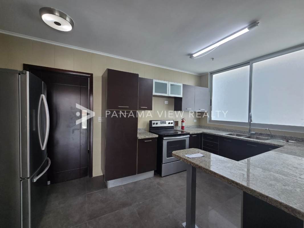 Open concept living dining marble flooring balcony panoramic view PH Latitude Costa del Este Panama City
