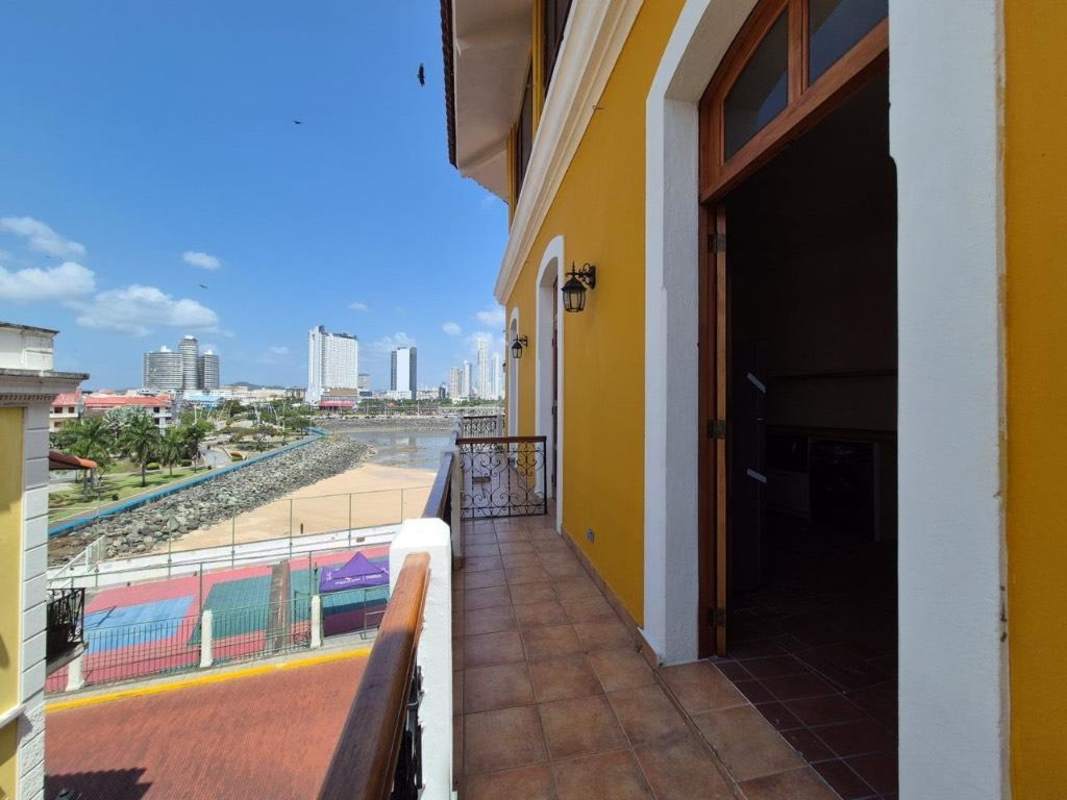 Bedroom with wood accents, split AC, ceiling fan, and closet Casco Viejo rental