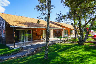 Wood clad rustic cabins with landscaped gardens for sale in Alto Boquete Panama