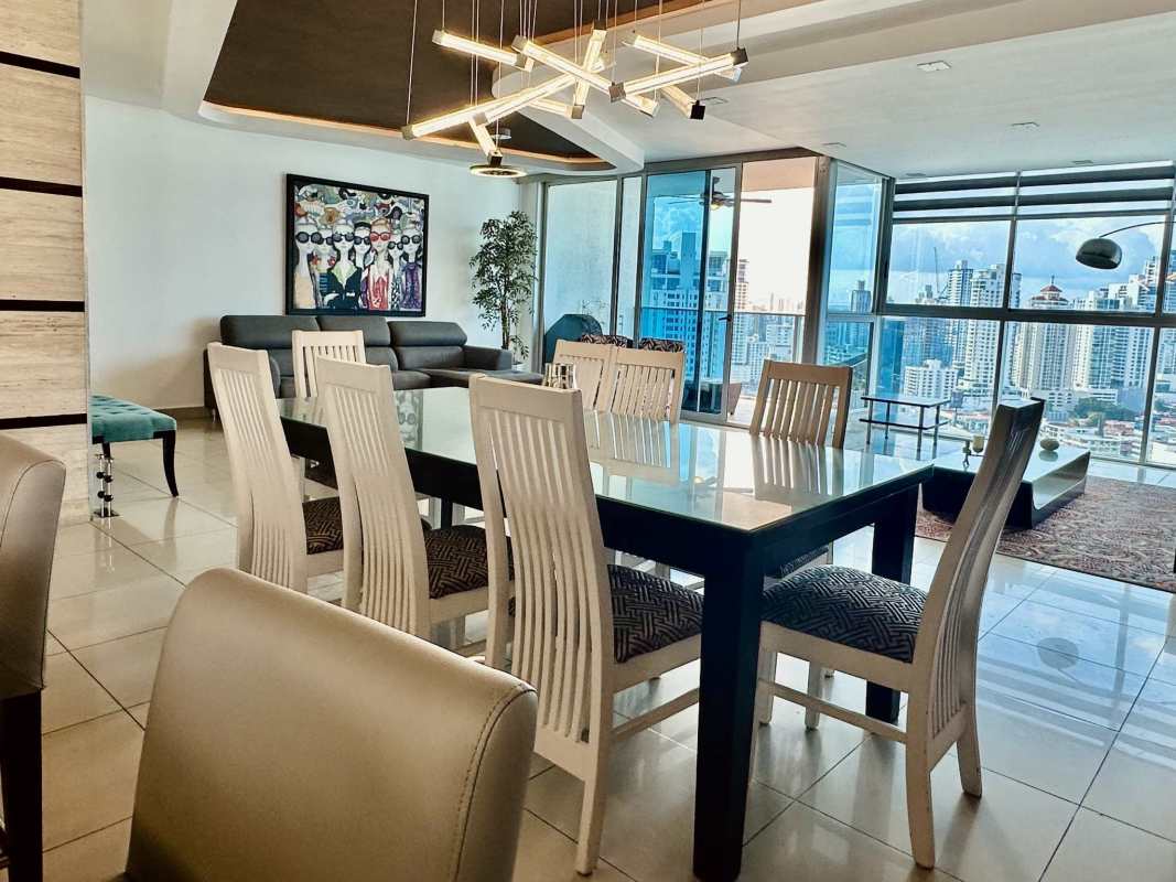 Open concept dining and modern kitchen area in PH Waterfalls furnished apartment Panama