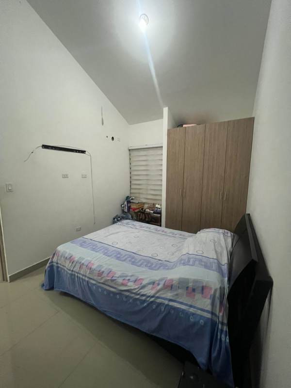 Exterior of two-level townhouse with parking area at La Reserva Villa Zaita Panama