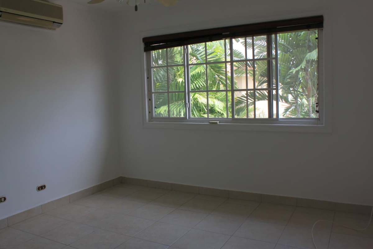 Swimming pool with jacuzzi surrounded by tropical garden Costa Azul house Panama