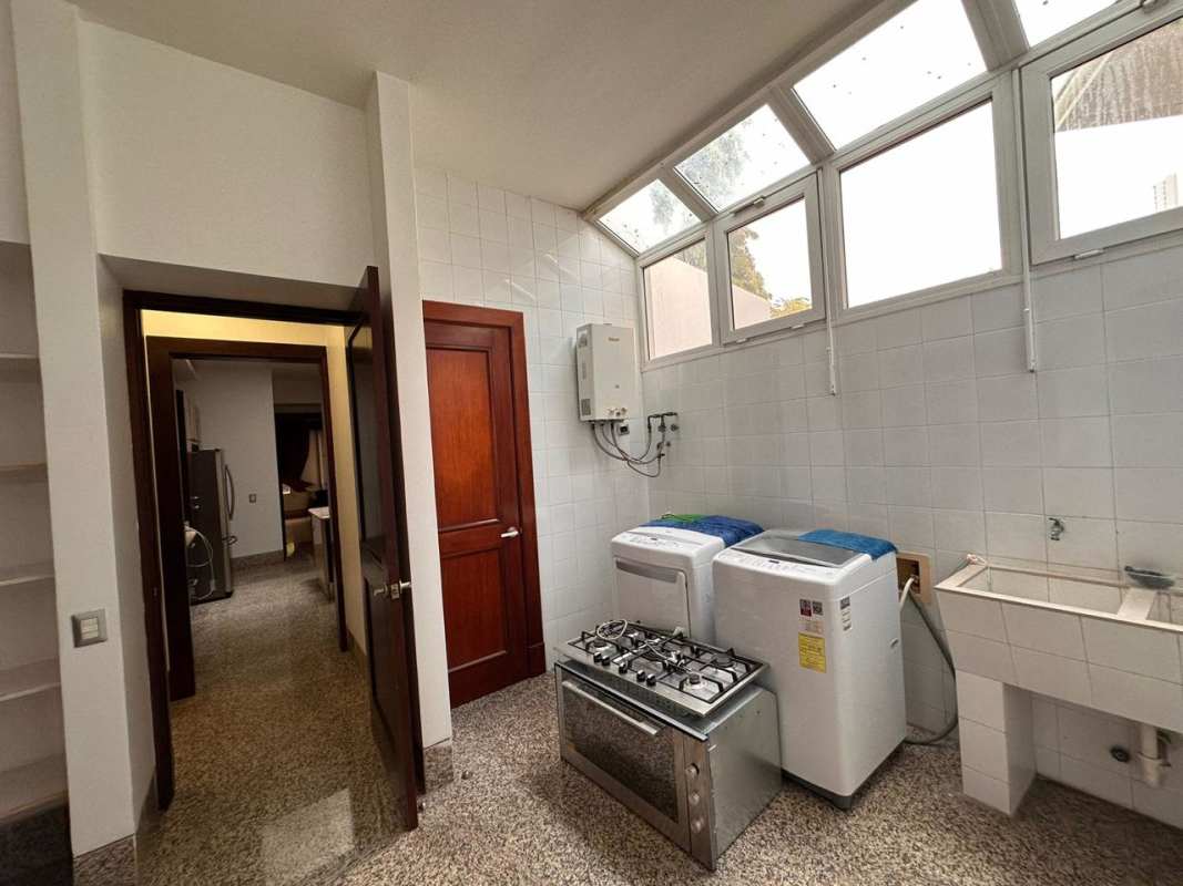 Backyard with swimming pool jacuzzi and landscaped garden Balmoral Costa del Este Panama