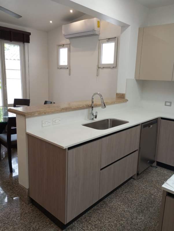 Spacious gourmet kitchen with island, quartz countertops and premium cabinetry Balmoral Panama