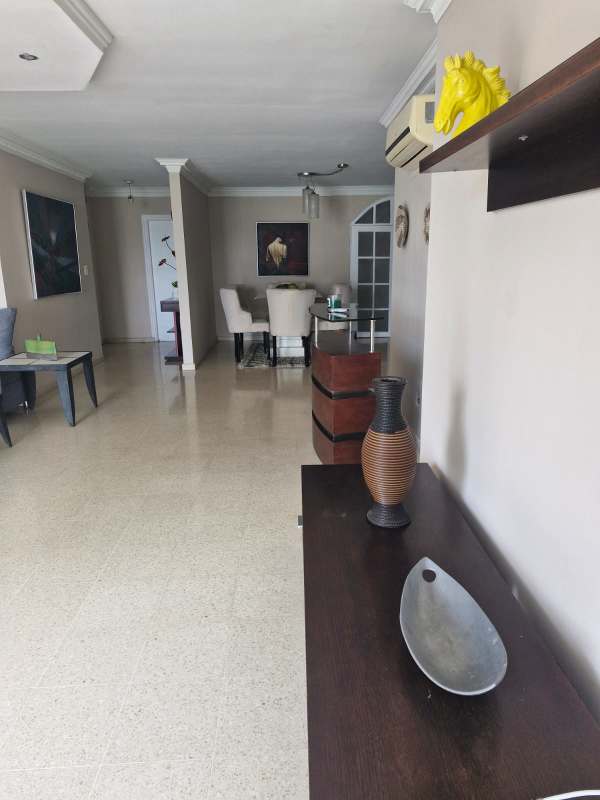 Kitchen with red tile backsplash stainless appliances gas stove in PH Marsella Marbella Panama City