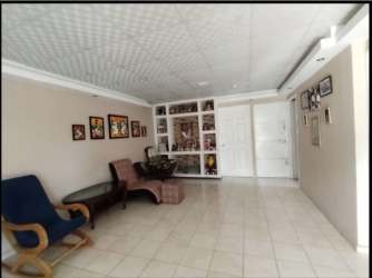 Green backyard with patio and garden space in corner home Arraiján Panama