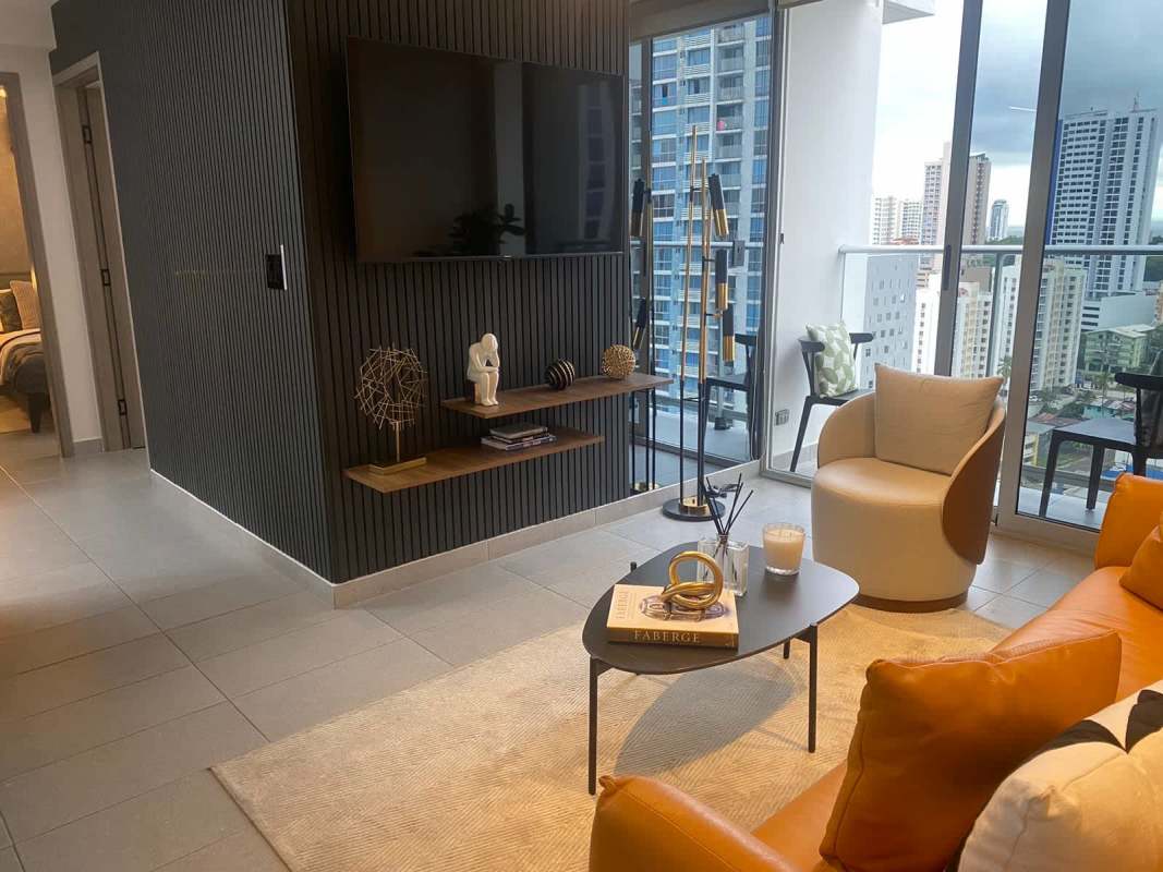 Apartment kitchen with breakfast bar and modern finishes at PH Rise San Francisco Panama