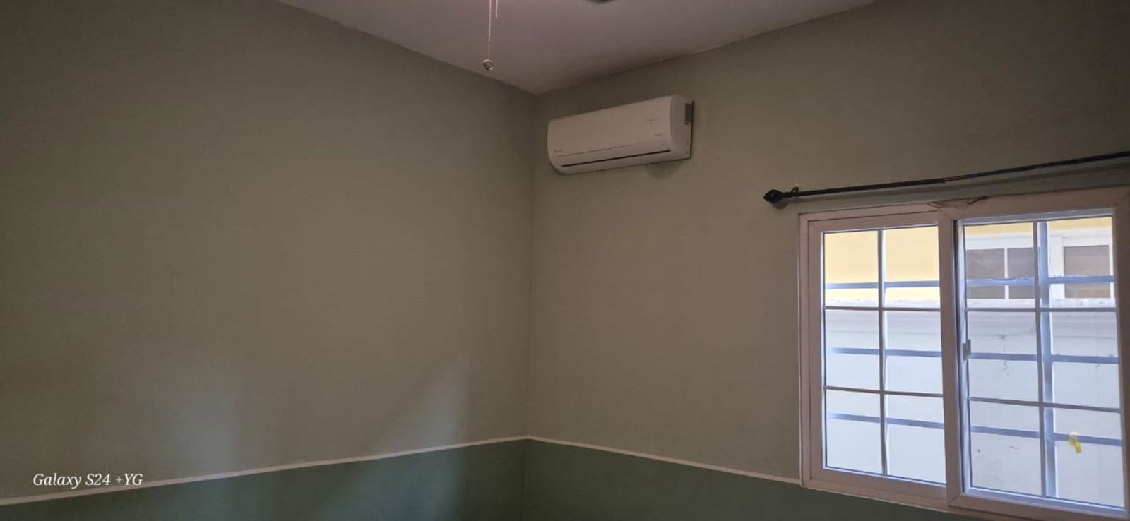 Modern bathroom with double sinks, granite vanity, glass-enclosed shower Rainforest Village Panama