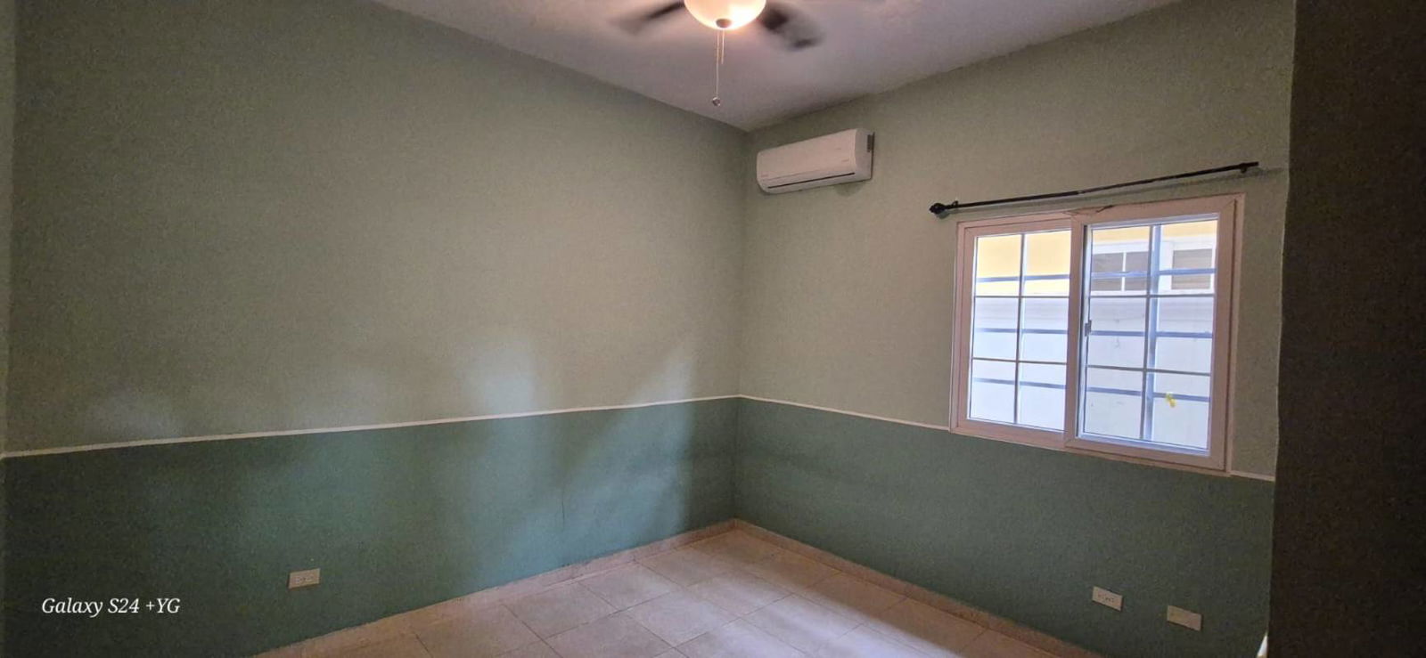 Covered patio with outdoor seating and bohio BBQ pavilion Rainforest Village Panama City