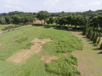 Large rural flat land bordered by trees in Río Hato close to Pacific beaches Panama