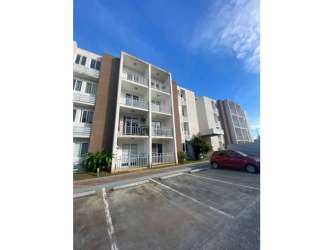 Exterior multi-story apartment building with balconies and parking in Costa Verde La Chorrera Panama