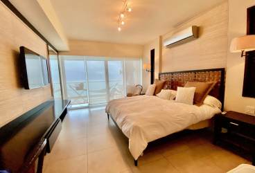 Infinity pool beachfront gardens Santa Clara Residences Panama oceanfront condo for sale beach paradise