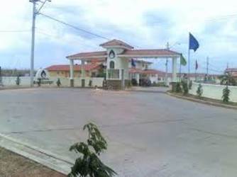 Entrance gate with security post at Altos del Campo community, La Chorrera Panama